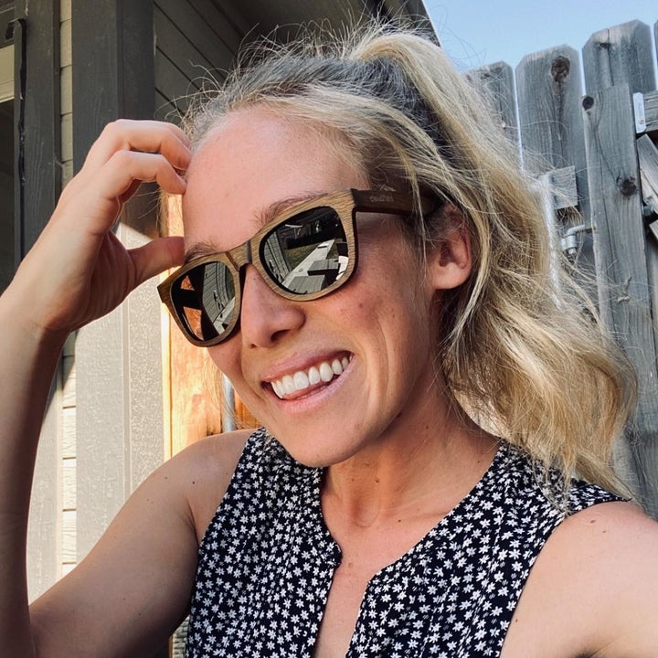 reviewer wearing the sunglasses