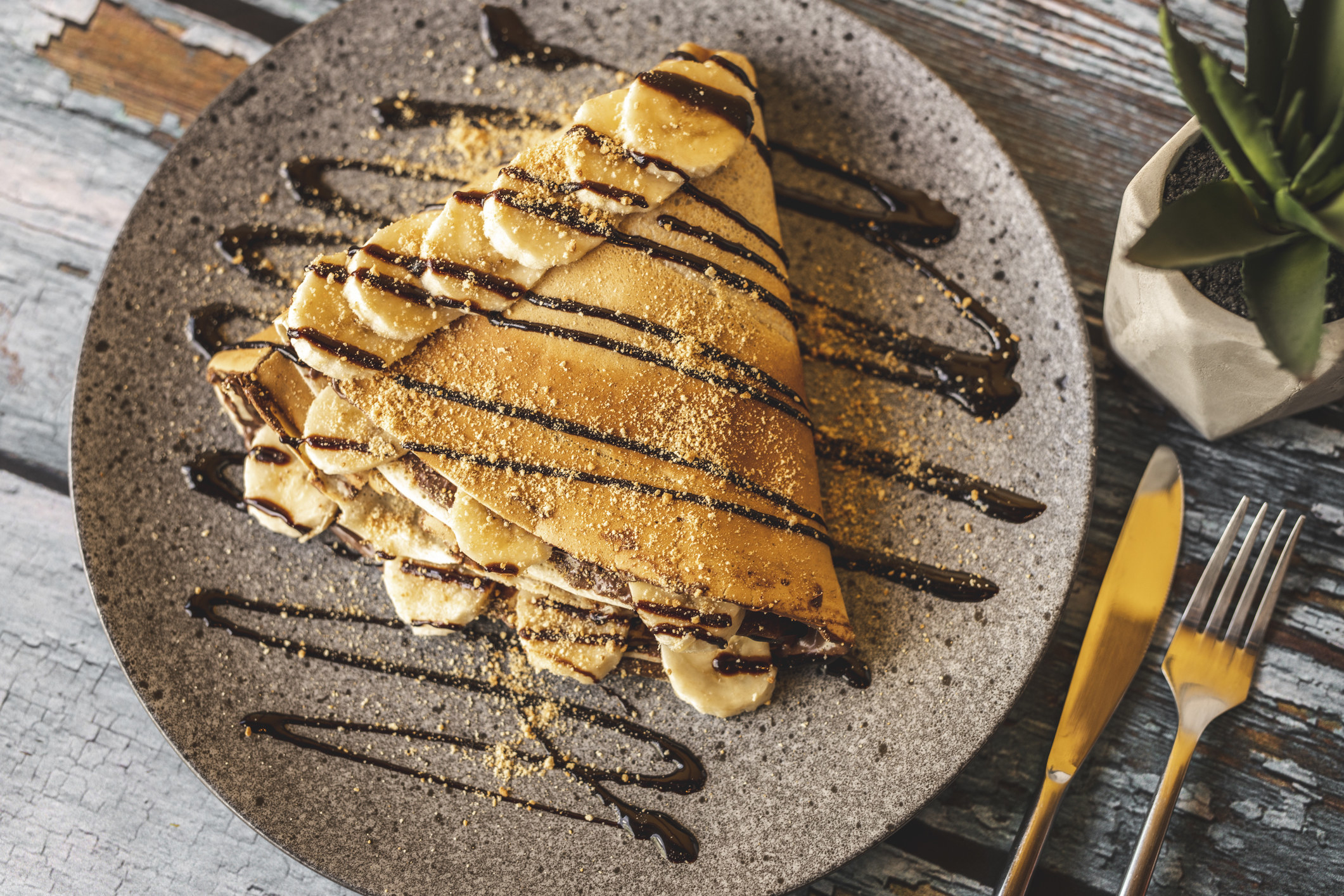 Nutella drizzled on a crepe