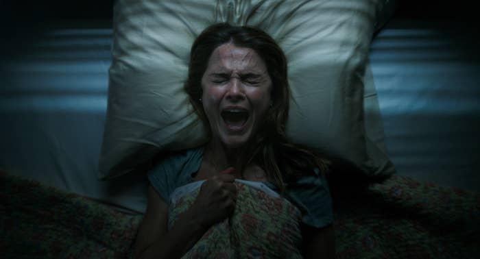 Keri Russell as Julia, screaming in bed