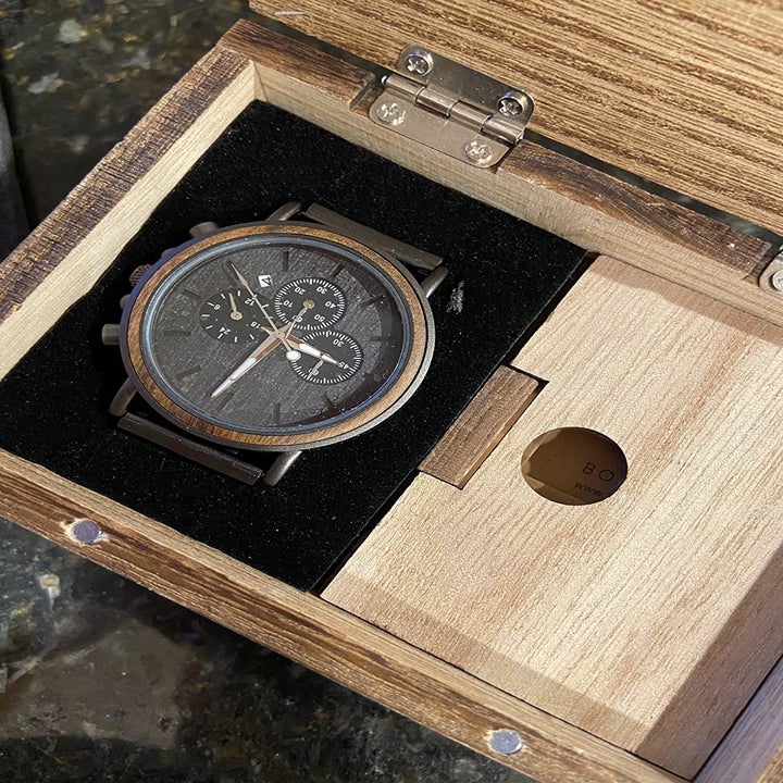 reviewer image of the watch in wooden box