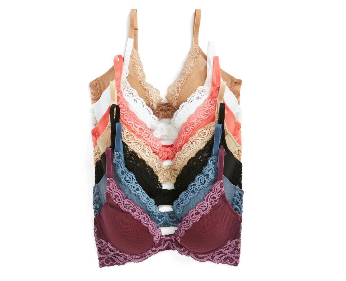 Lineup of eight colorful bras with lace detail
