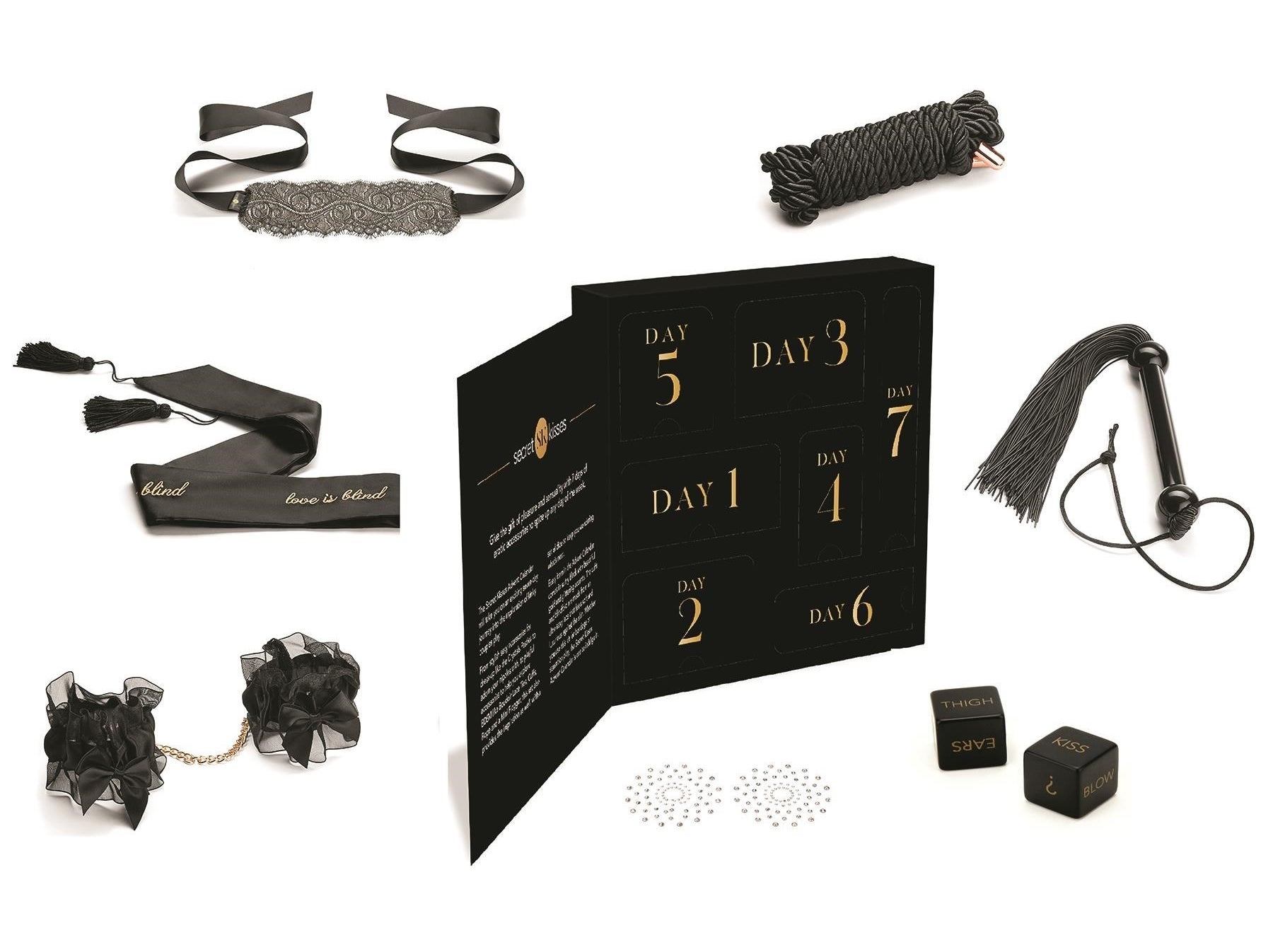 Black and gold advent calendar surrounded by black BDSM products