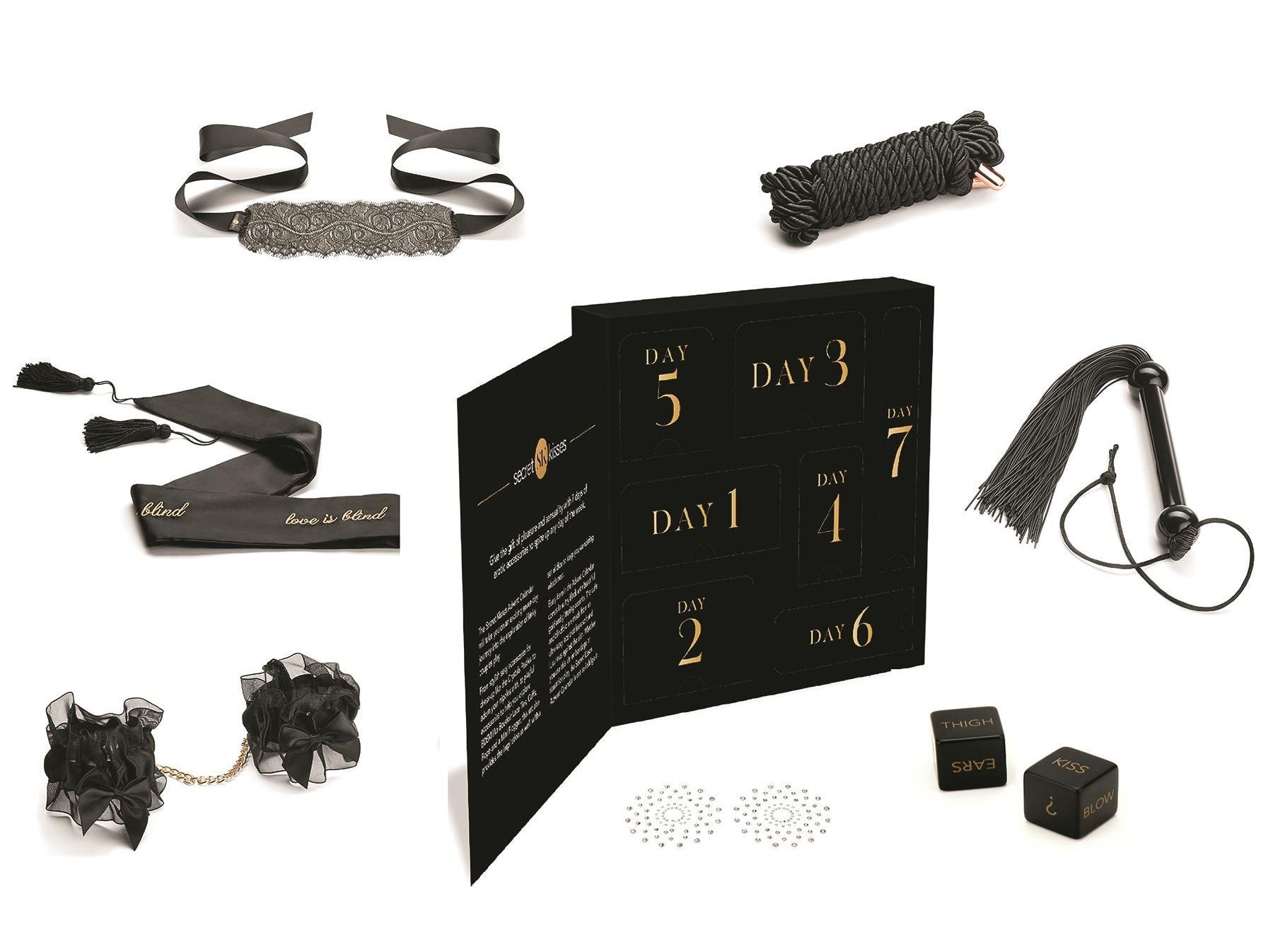 Black and gold advent calendar surrounded by black BDSM products