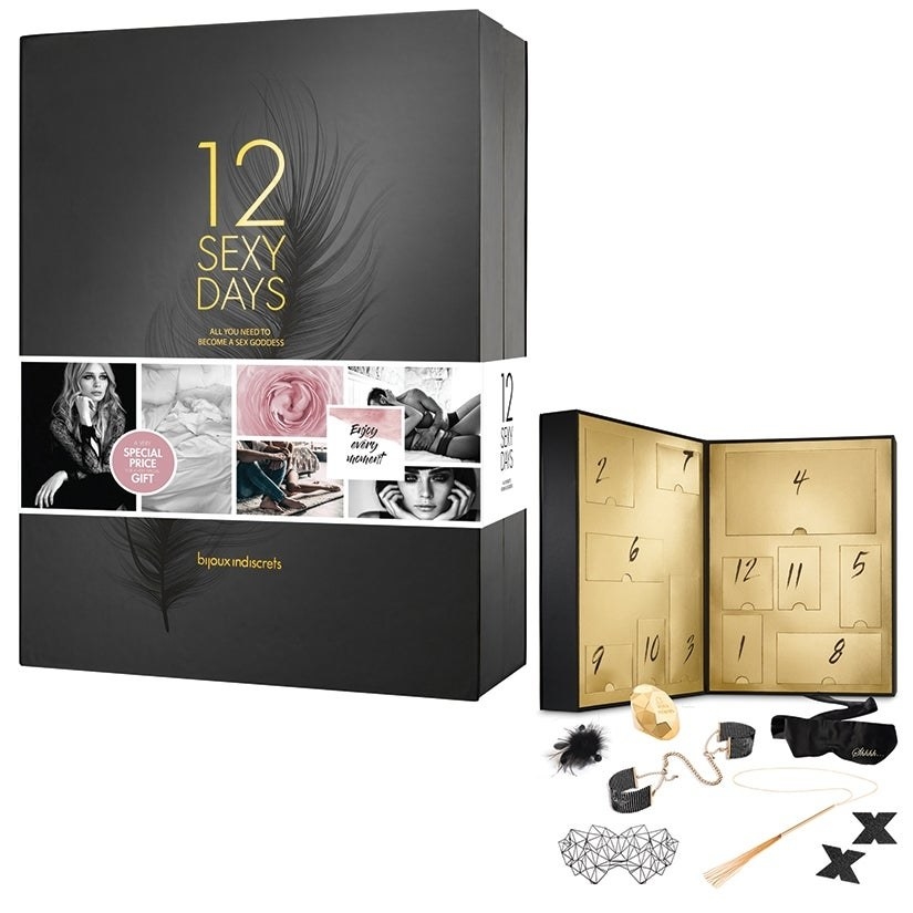 Black and gold advent calendar box surrounded by BDSM accessories