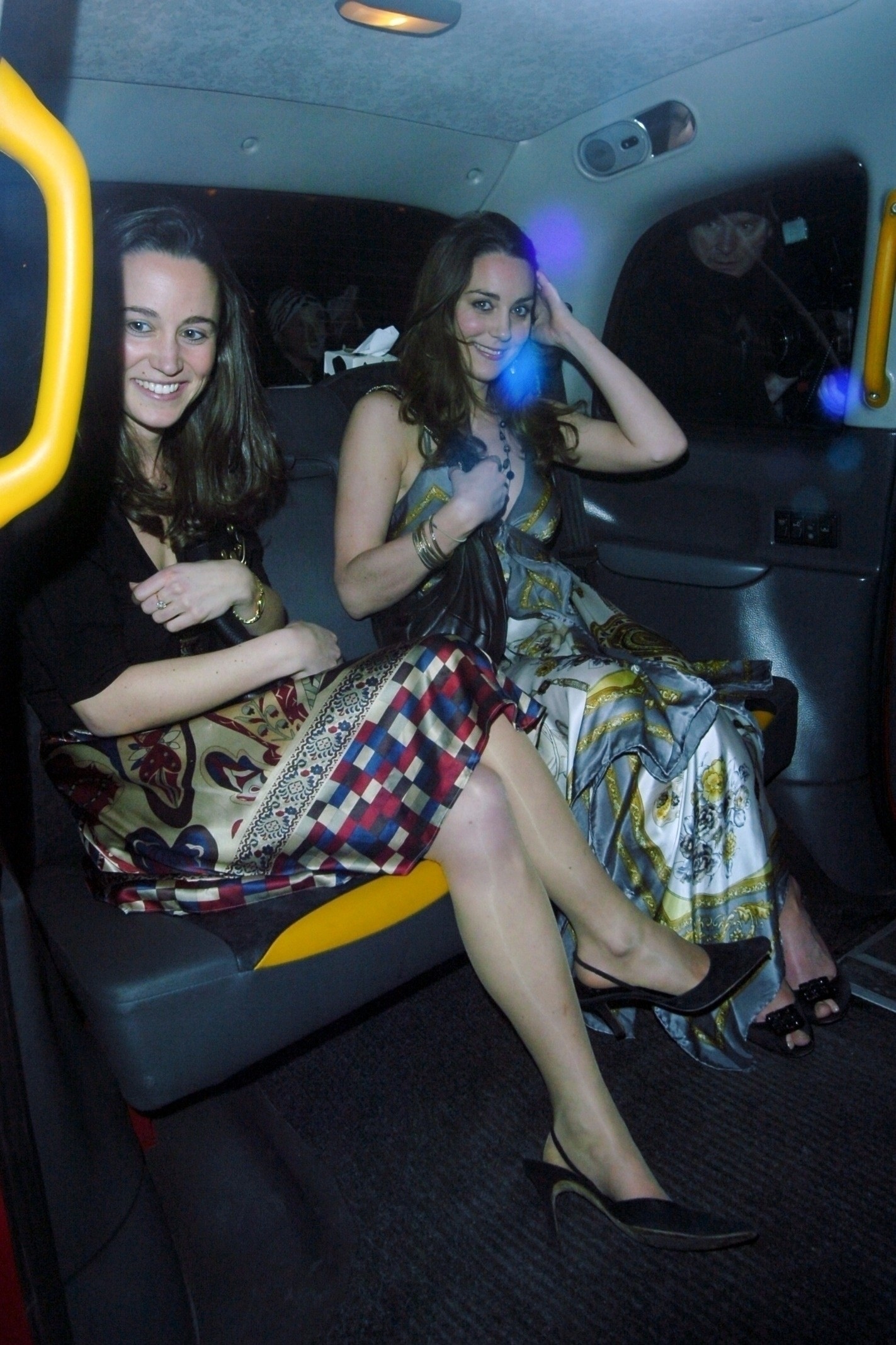 Kate and Pippa in the back of a car when they were in their 20s