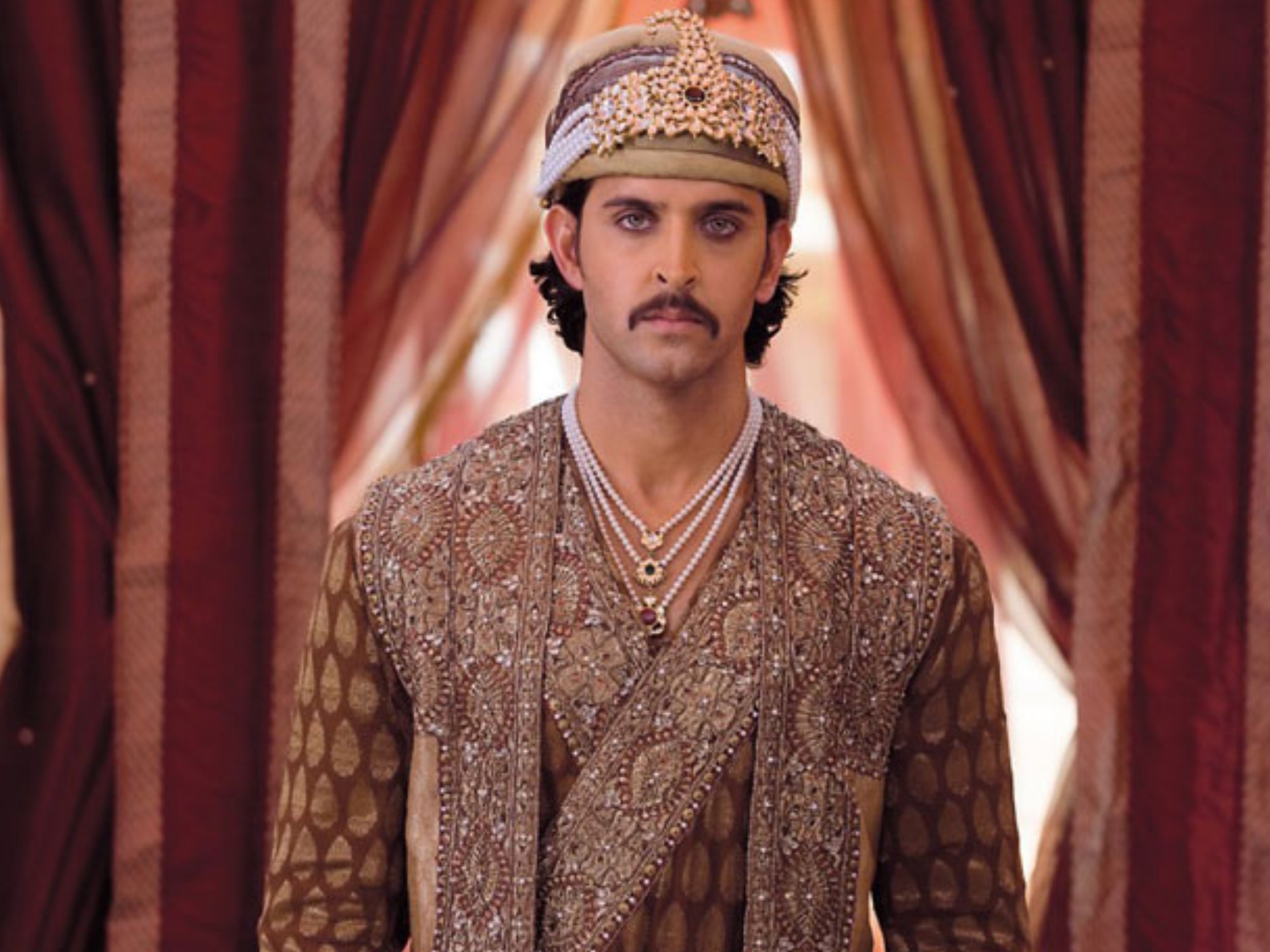 Bollywood actor Hritik Roshan dressed in traditional attire with a turban and jewellery for his character as &#x27;Akbar&#x27; in the movie Jodha Akbar.