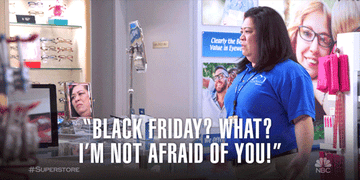 Gif of a cashier from the show &quot;Superstore&quot; saying, &quot;Black Friday? What? I&#x27;m not afraid of you&quot;