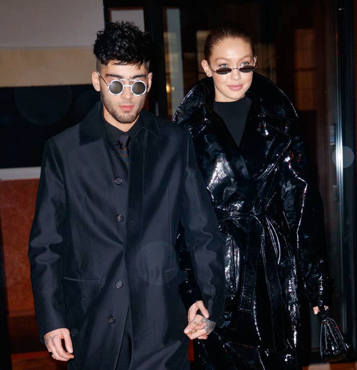 Zayn and Gigi hold hands while walking together