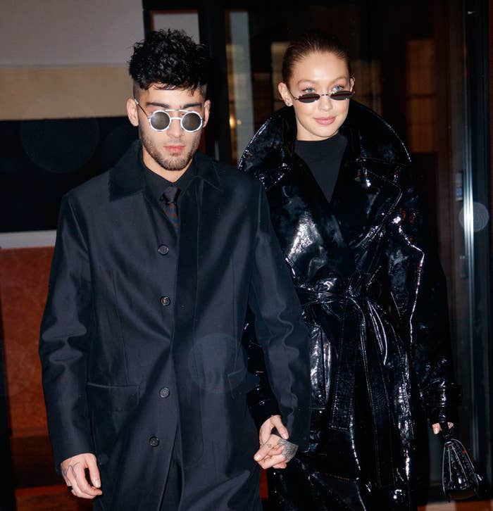 Zayn and Gigi hold hands while walking together