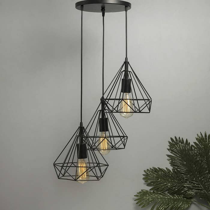 Black pendant lights in varying heights