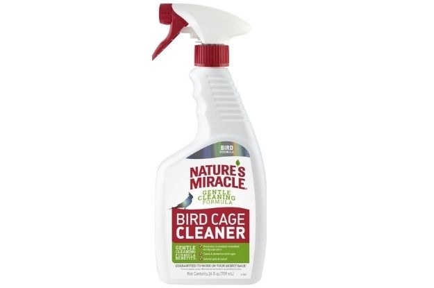 A white bottle of bird cage cleaner