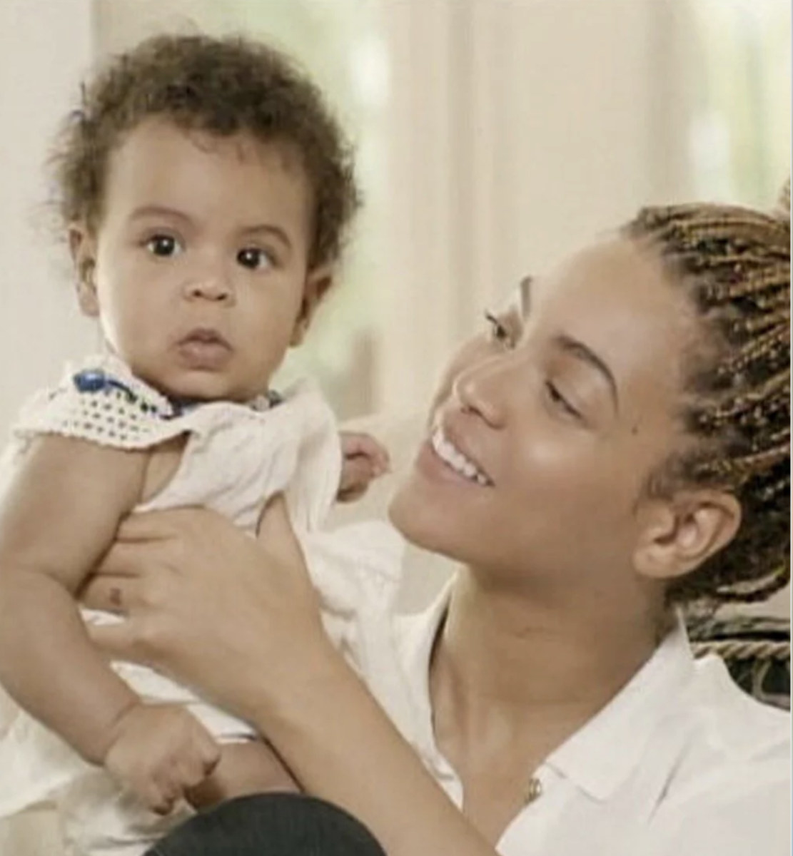 Beyoncé holding baby Blue Ivy in her documentary "Life Is But a Dream"