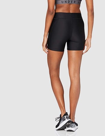 Model wearing black bike shorts
