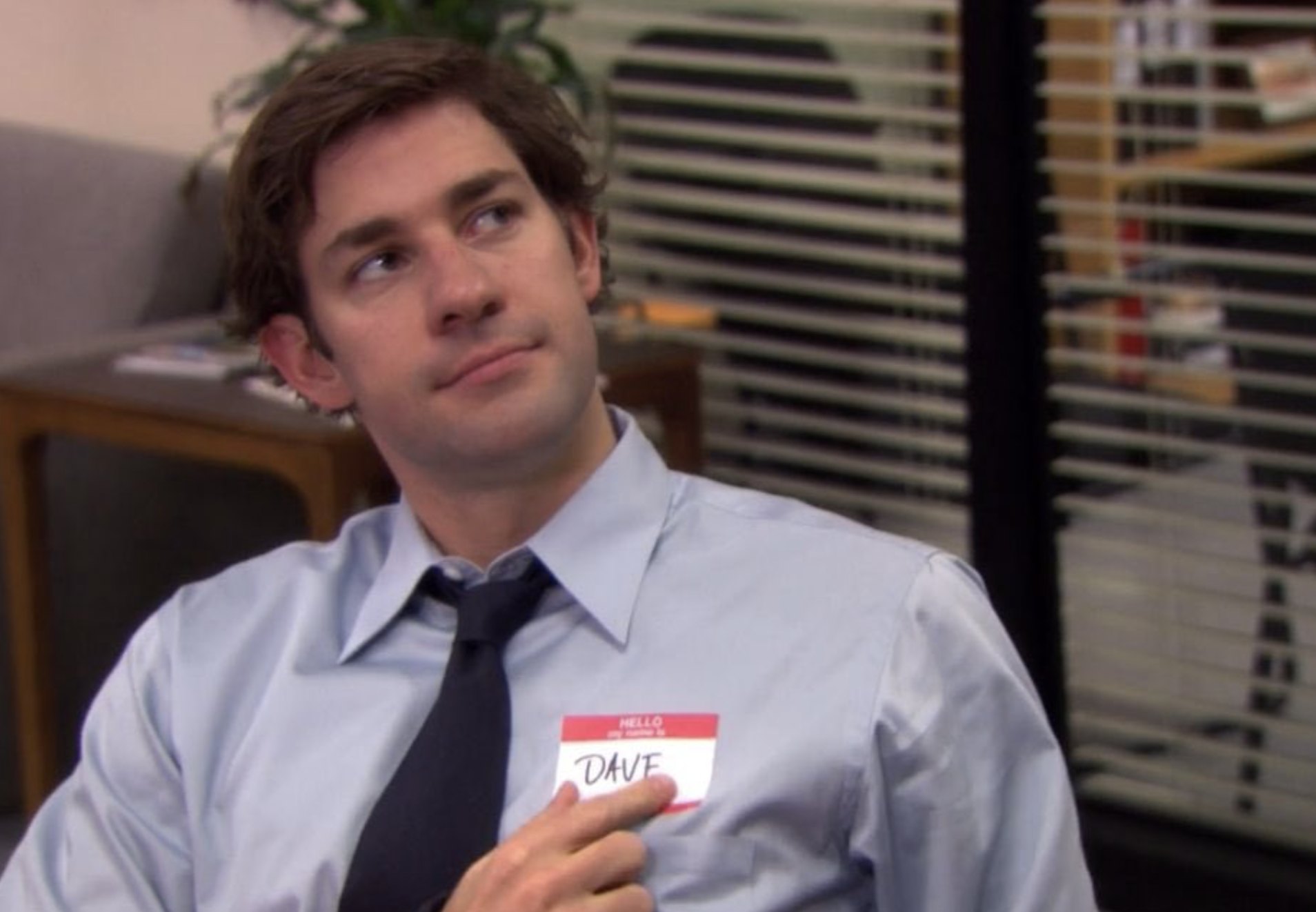 Jim wears a name tag on his shirt reading: Dave
