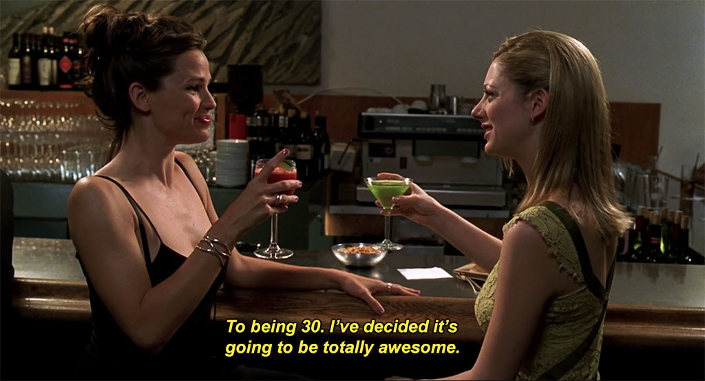 Jennifer Garner as Jenna and Judy Greer as Lucy drink at a bar in &quot;13 Going on 30&quot;