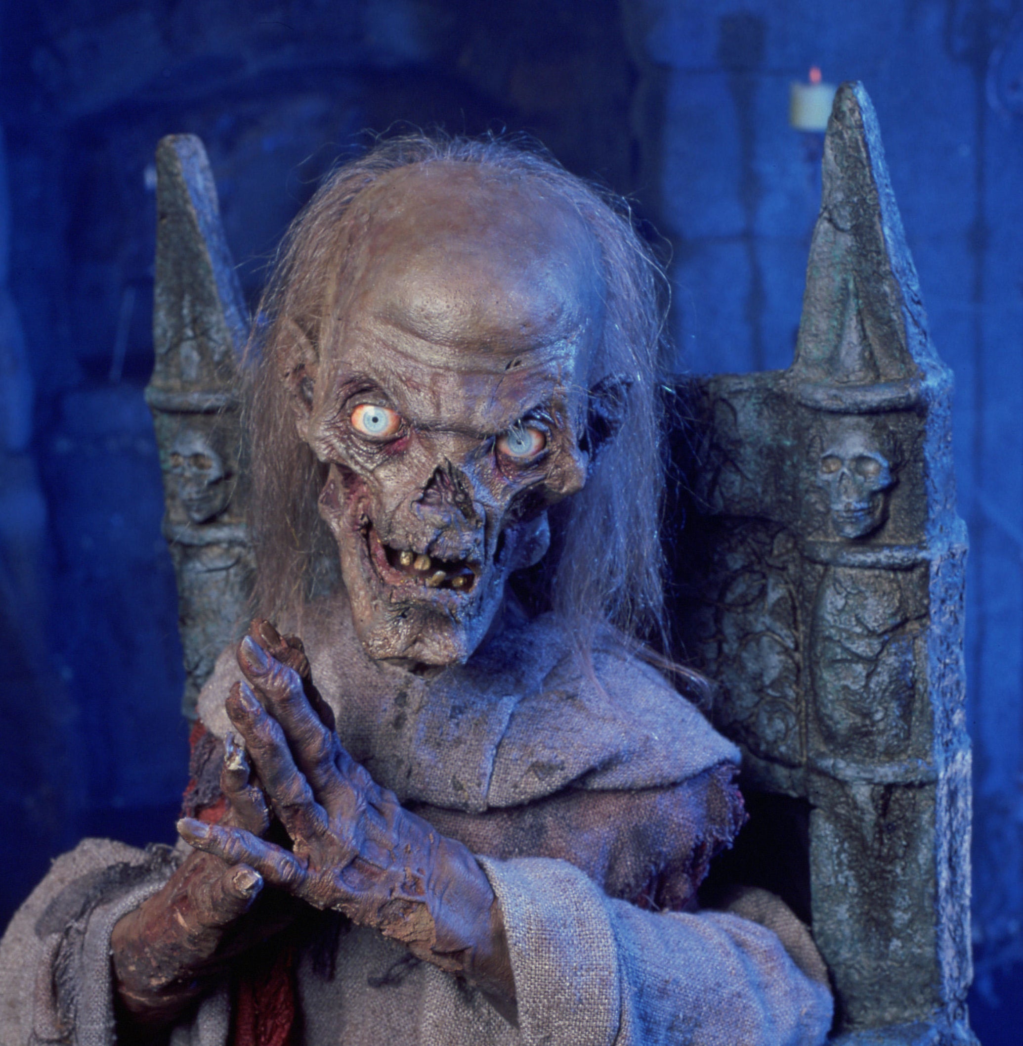 the crypt keeper sitting on his chair