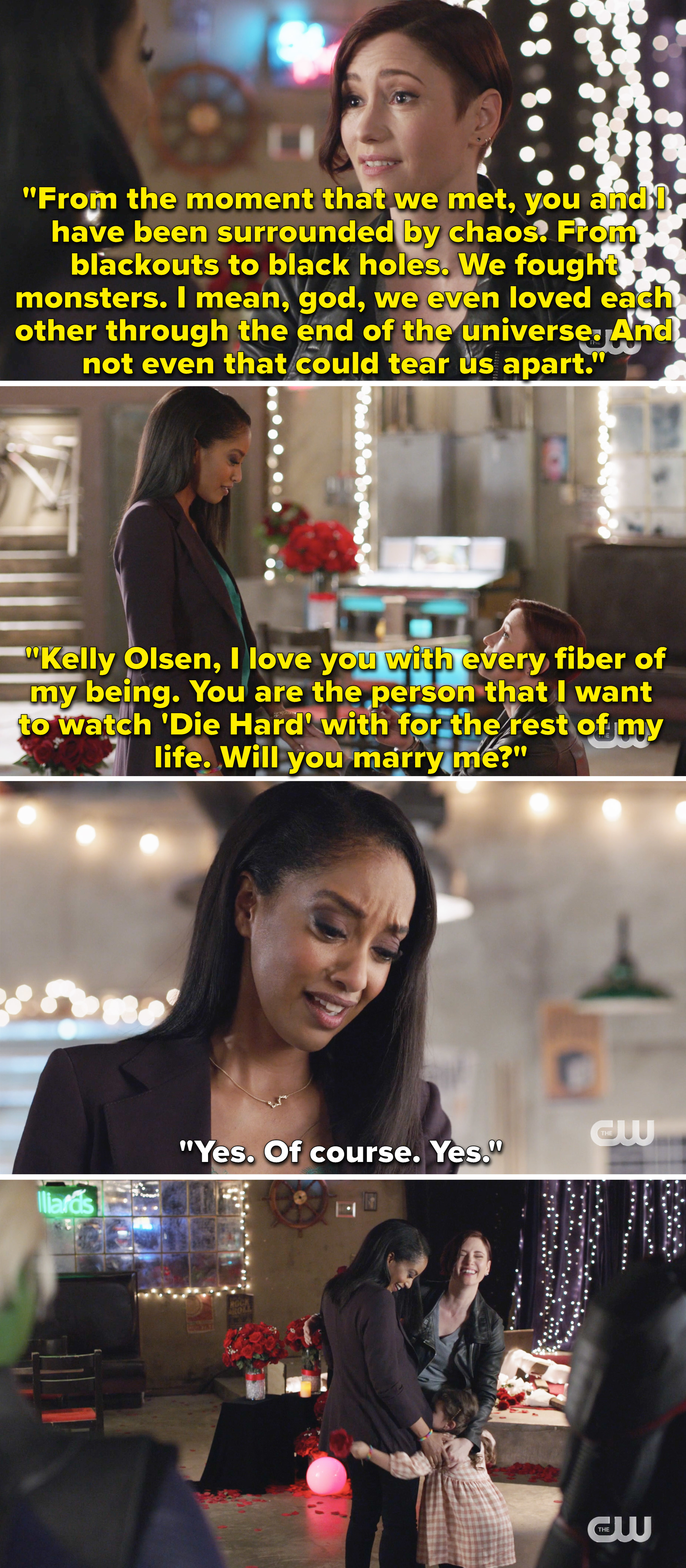 Alex getting down on one knee and proposing to Kelly and Kelly saying yes