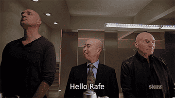 People greeting each other and shaking hands at urinals