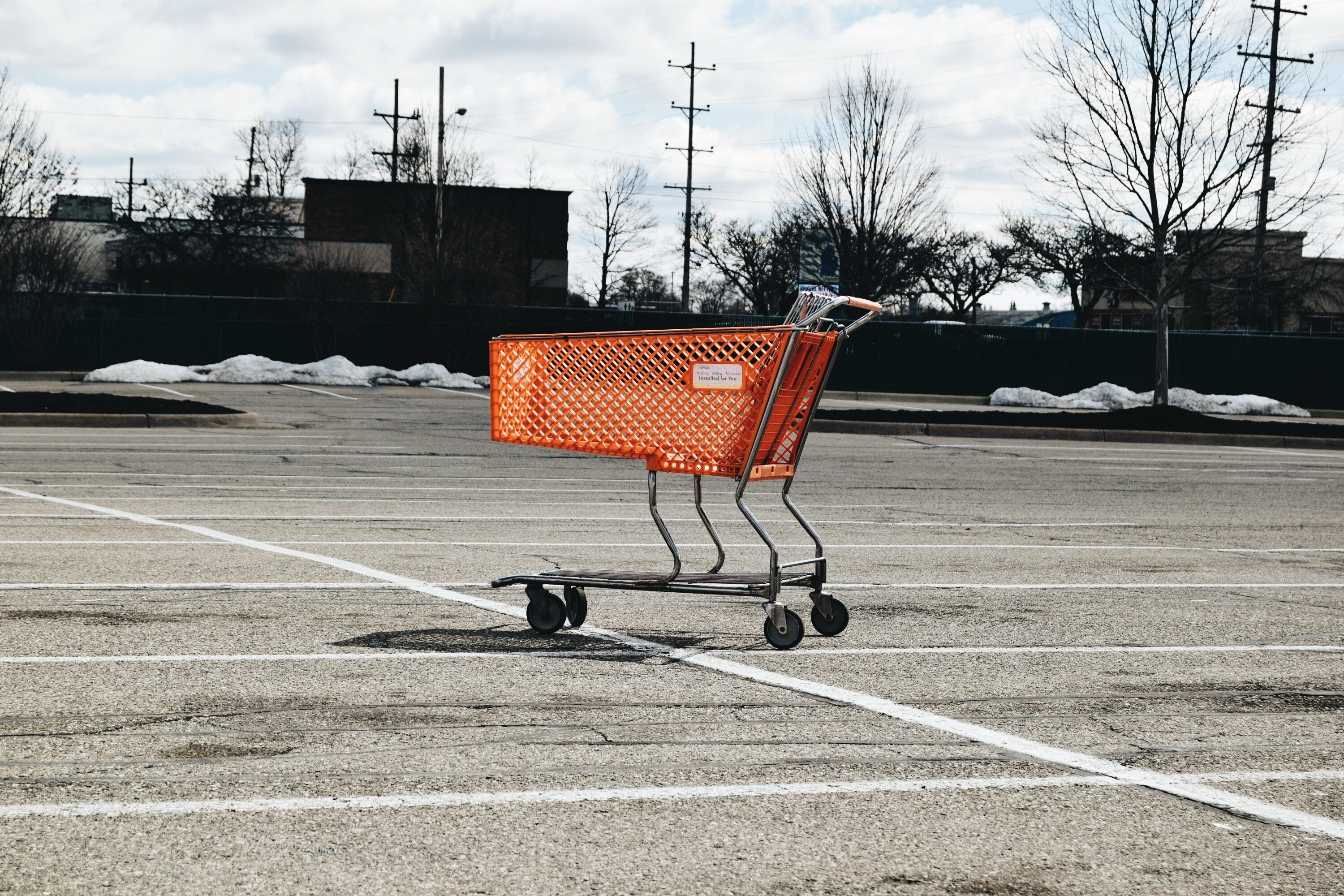 Shopping cart in a parking lot