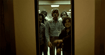 Zombies charging into an elevator