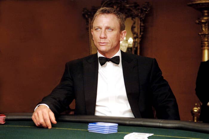 Daniel as Bond, James Bond, in a bow tie at a casino card table