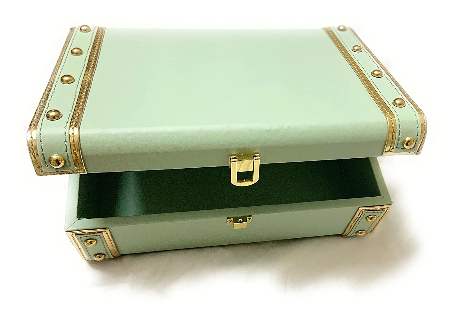 A mint storage box with golden embellishments
