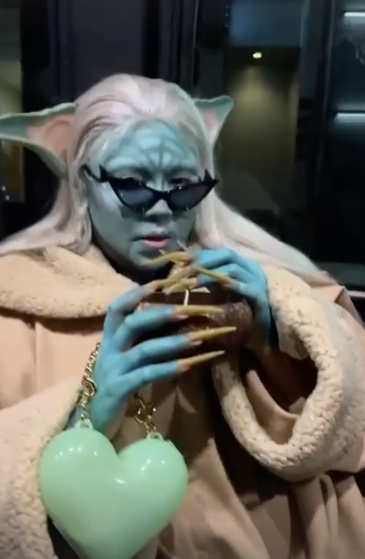 Lizzo dresses as Baby Yoda for Halloween, gives cameras Jedi hand wave