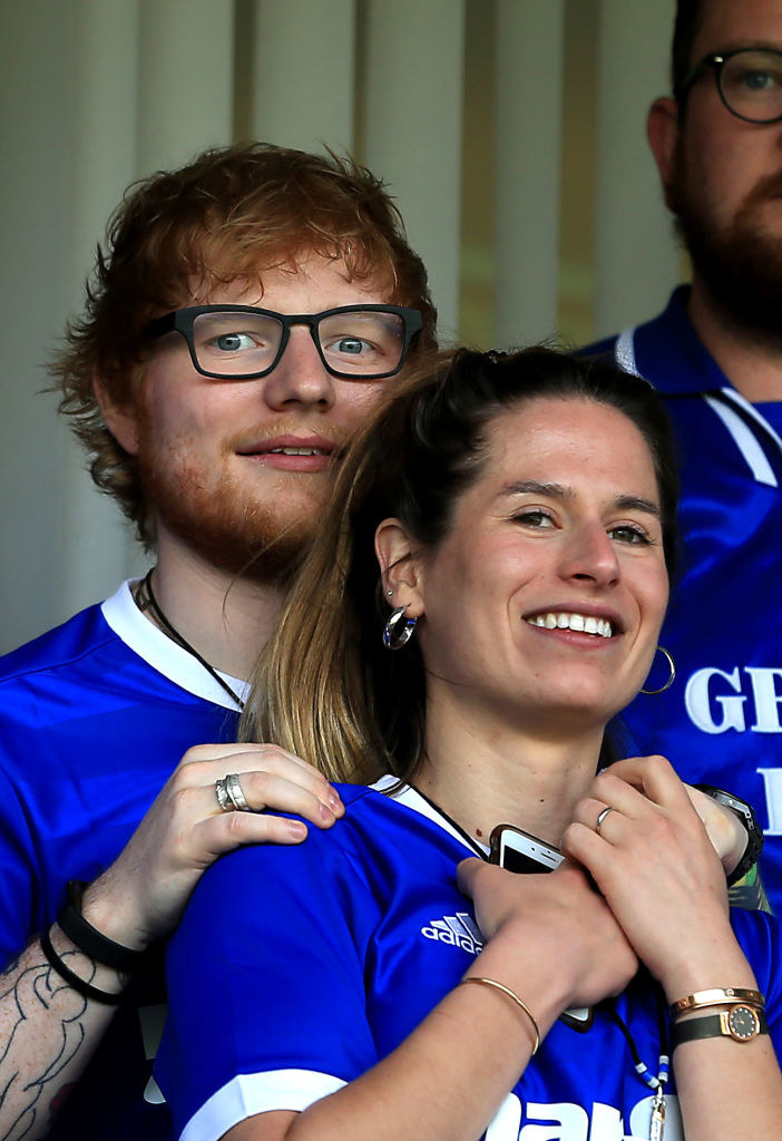 Ed Sheeran and fiancé Cherry Seaborn look on during the Sky Bet Championship match between Ipswich Town and Aston Villa