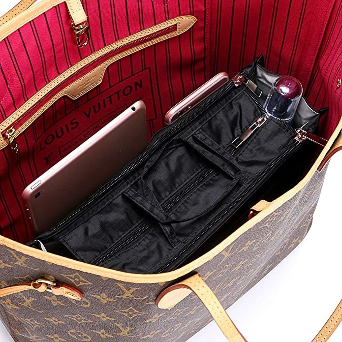 The organizer inside a Louis Vuitton tote bag