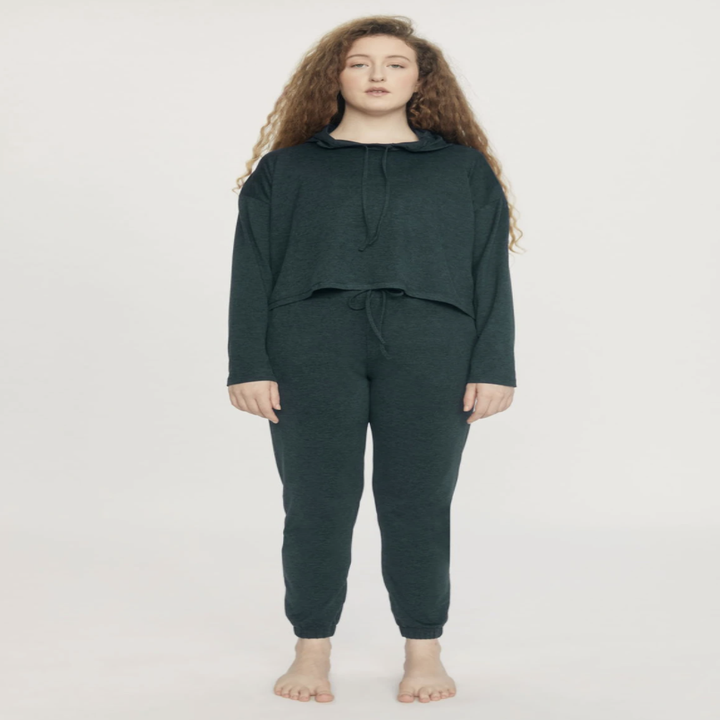 model wearing the hoodie in the color moss