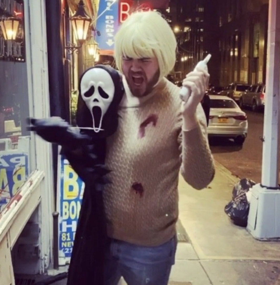 Someone dressed as Casey being attacked by Ghostface in &quot;Scream&quot;