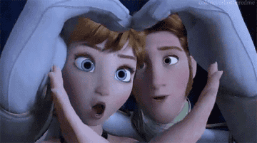 Anna and Hans making a heart with their hands as they sing &quot;Love Is an Open Door&quot; in &quot;Frozen&quot;