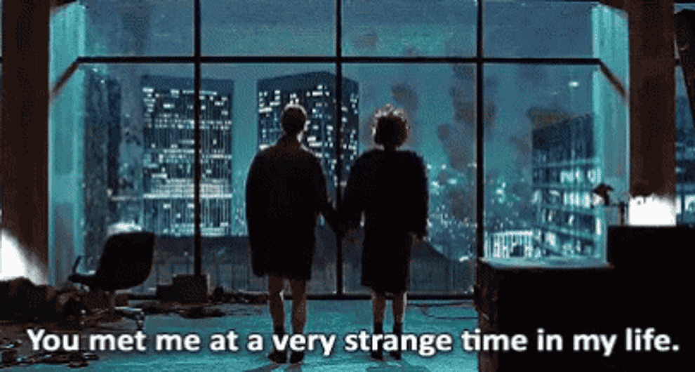The Narrator and Marla hold hands as buildings explode and the Narrator says, &quot;You met me at a very strange time in my life&quot;