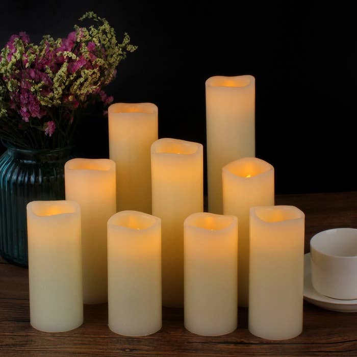 nine flameless LED candles of different heights