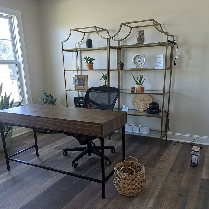 two of the cases behind a reviewer's desk