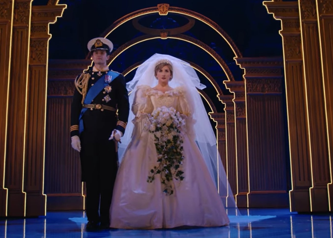 Roe Hartrampf as Prince Charles and Jeanna de Waal as Princess Diana in her wedding gown.