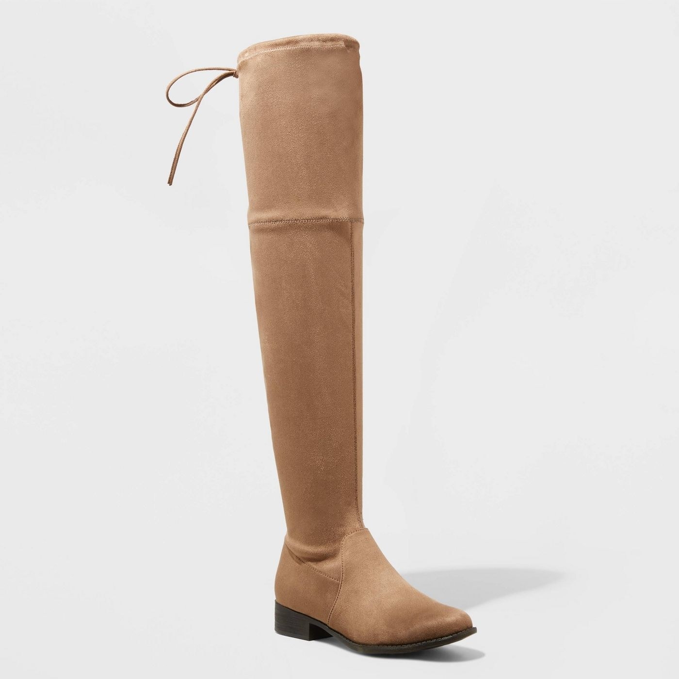 A tan over the knee boot
