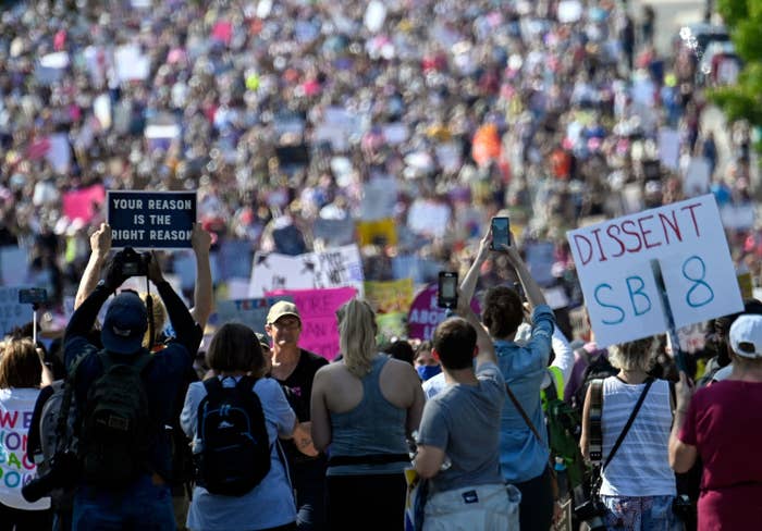 A large crowd of people protesting