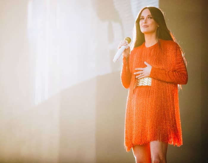 Kacey Musgraves performs at Coachella in 2019 in a short fringed dress