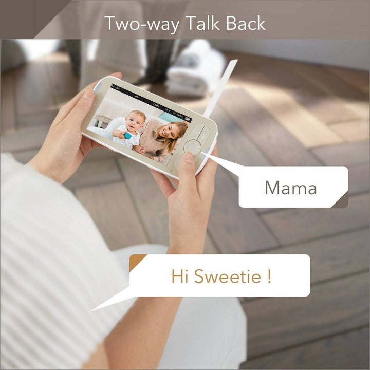 Mom holding baby monitor