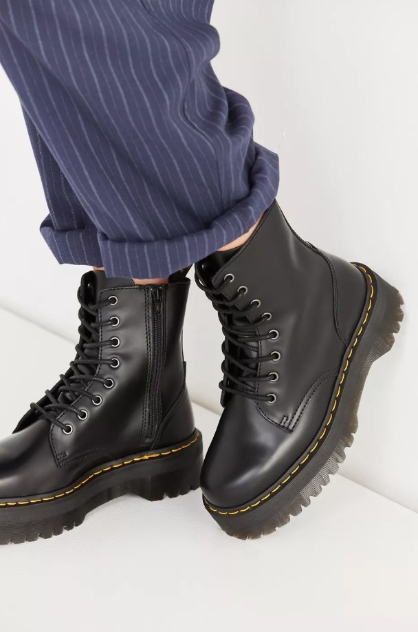 Model wearing black platform Doc Marten ankle boots