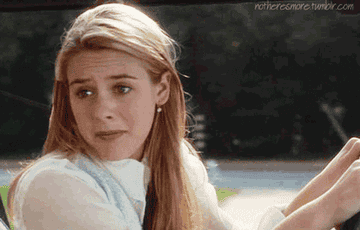 a gif of alicia silverstone as cher in clueless saying my bad