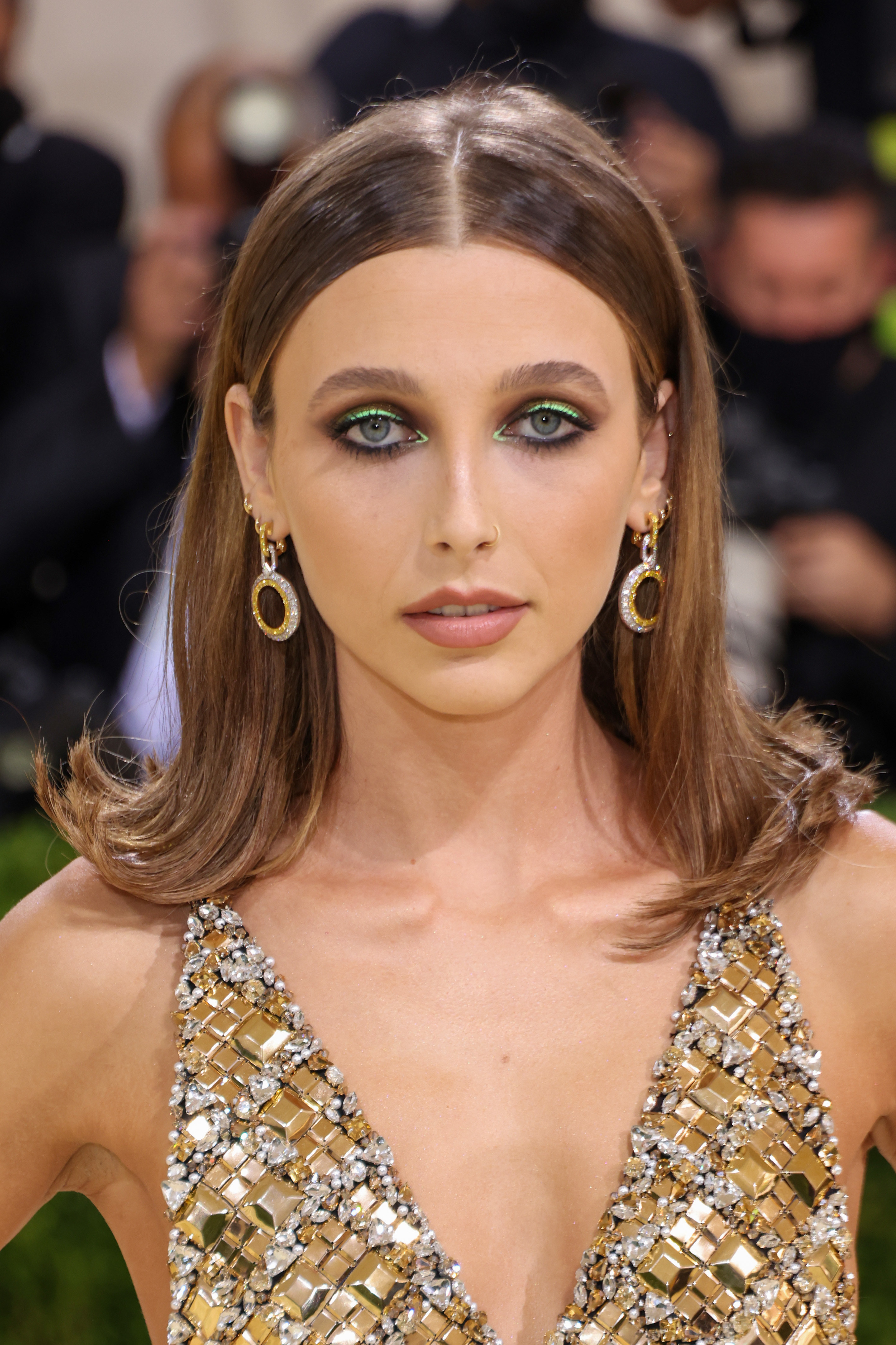 Influencer Emma Chamberlain Shines in Gold Louis Vuitton For Met