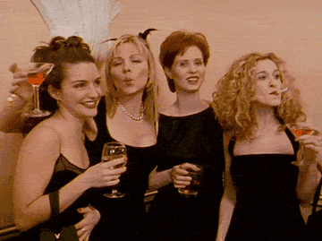 gif of the characters from &quot;sex and the city&quot; posing for a picture