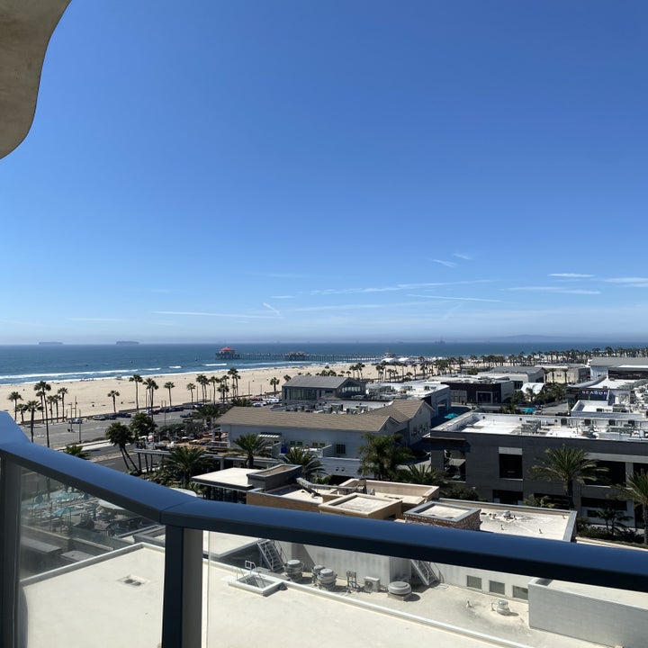 An oceanfront view from a hotel balcony