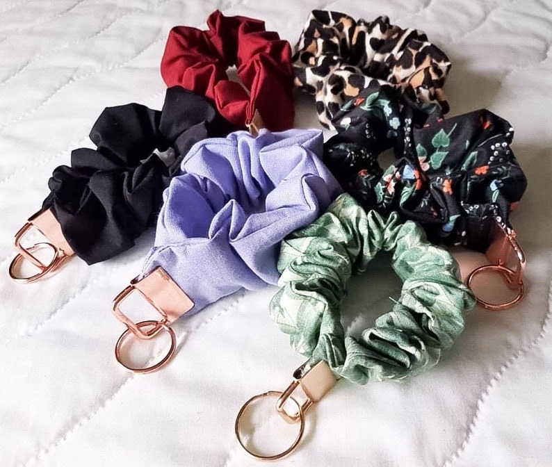 different colored scrunchies with key rings on the end