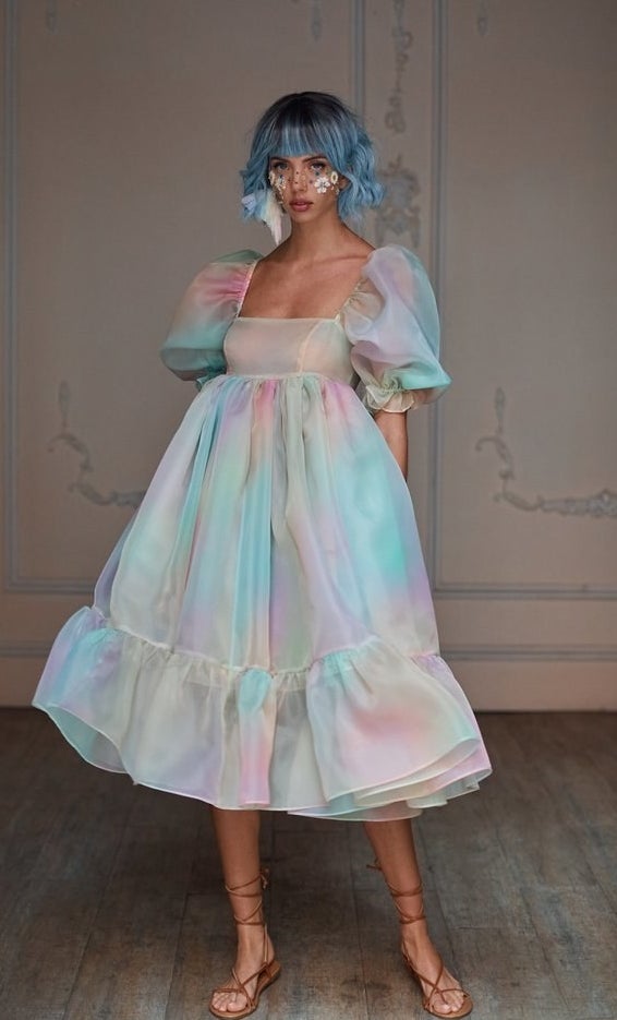 model wearing the rainbow iridescent puff-sleeve midi dress