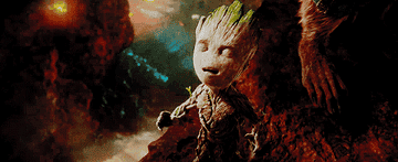 Groot raising his hands triumphantly