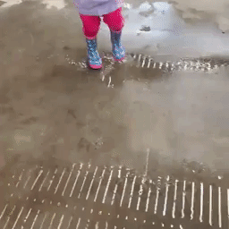 Reviewer's video of their child wearing the boots and jumping in a puddle