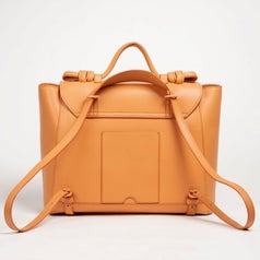 the orange version with the straps in the backpack style